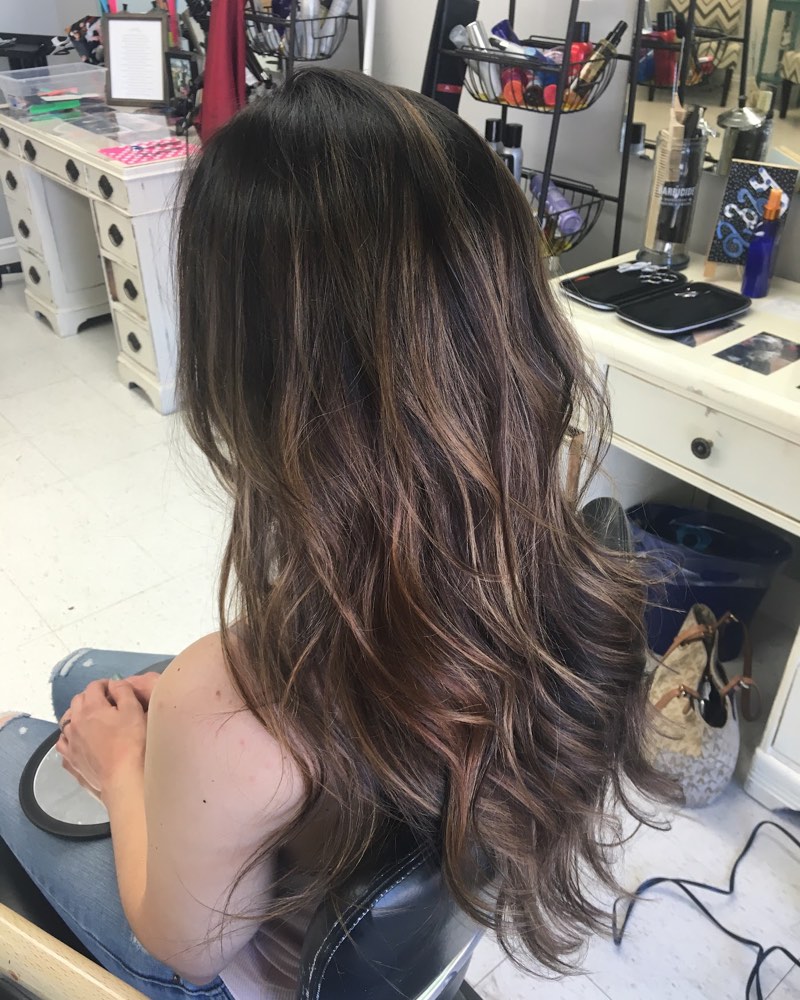 Inside Teased Hair Studio: long brunette layers in the styling chair